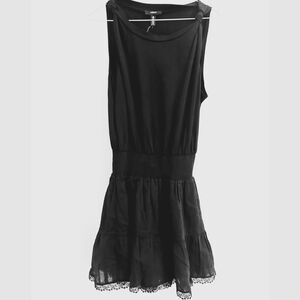 NWT AQUA black babydoll-style mini dress with eyelet lace details on the hem. Si